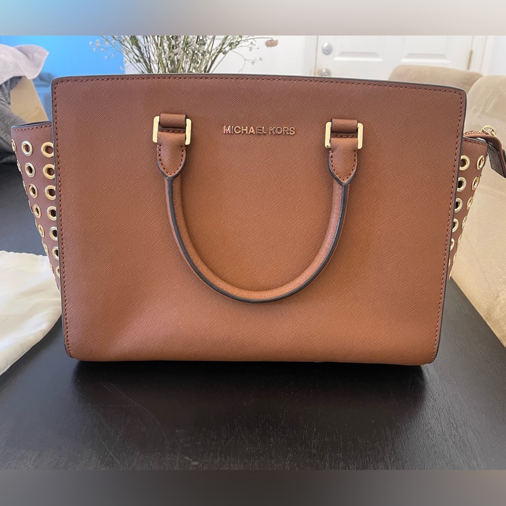 Brown with gold accents Michael Kors tote bag. Comes with dust bag.